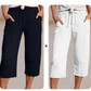 Shorts femininos plissados de algodão e linho em cor lisa